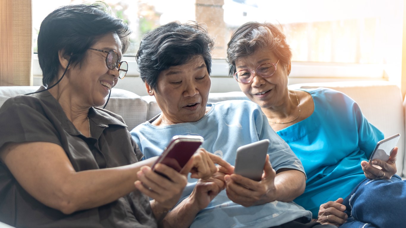 Older women are playing with smart phones