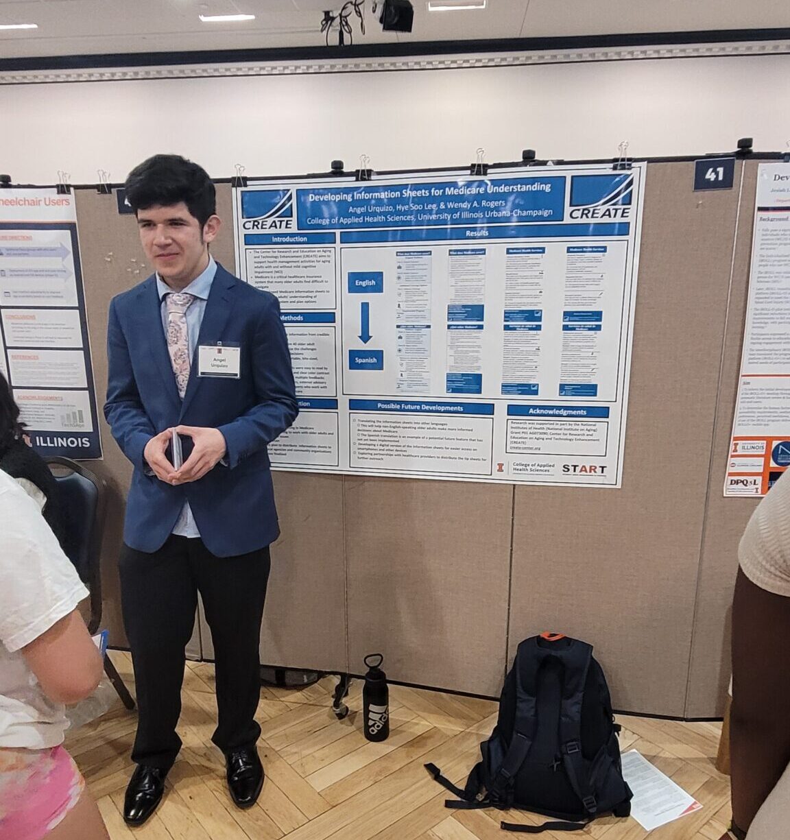 Student presenting a poster