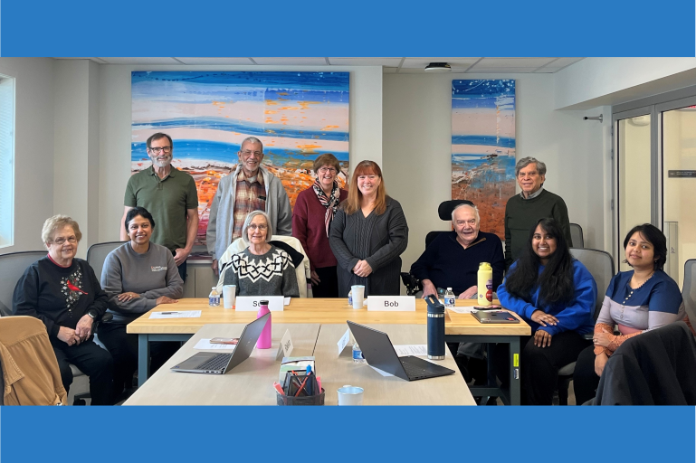 Photo of all panel and staff